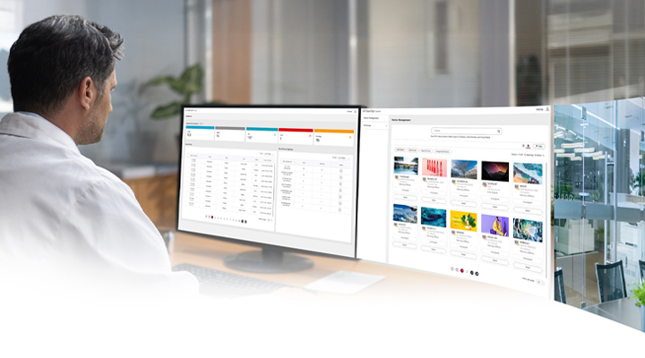 An IT administrator is monitoring devices while viewing the dashboard and equipment management screen of the LG SuperSign Control+ solution.